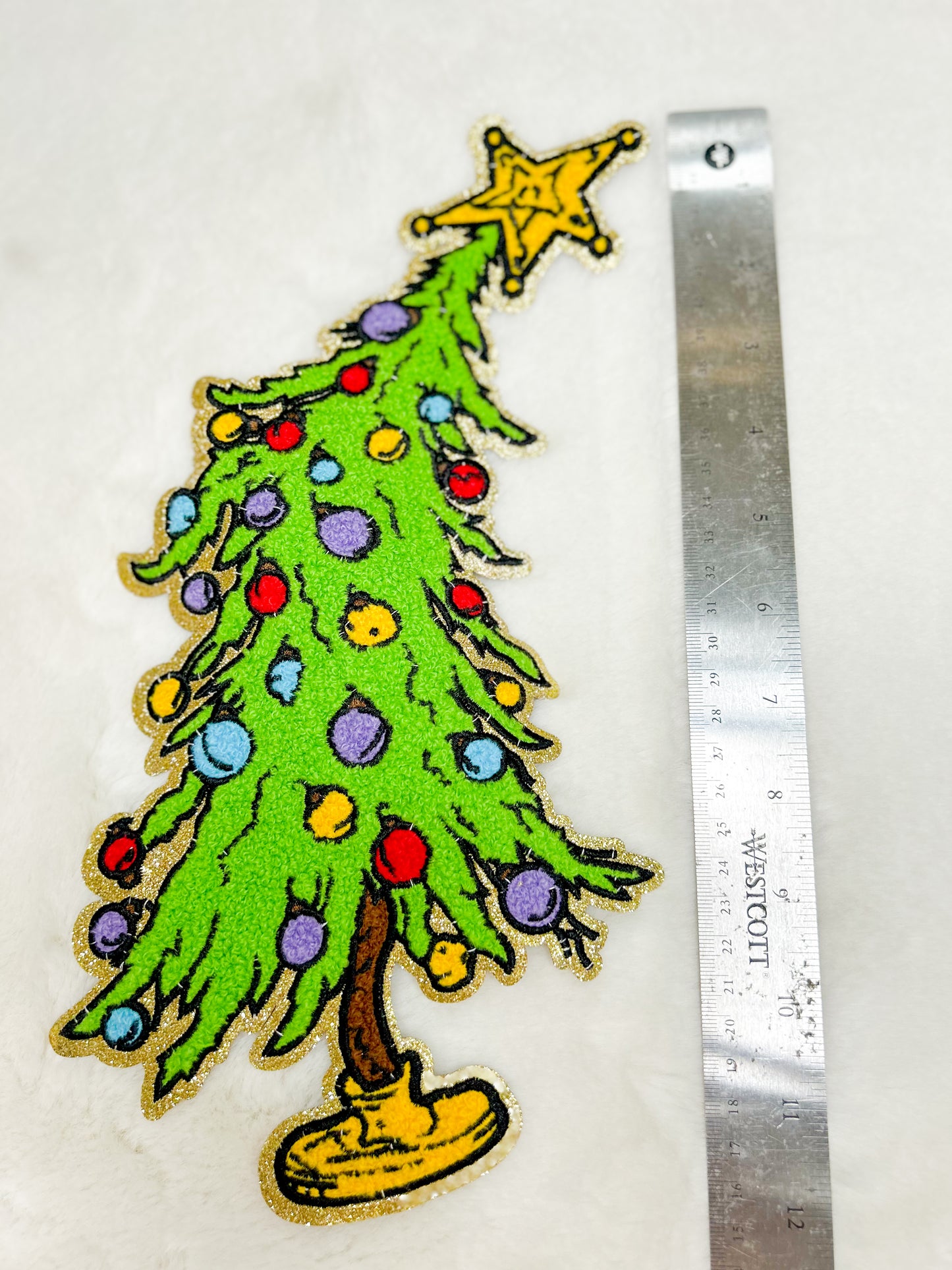Patch-Leaning Christmas Tree with Ornaments