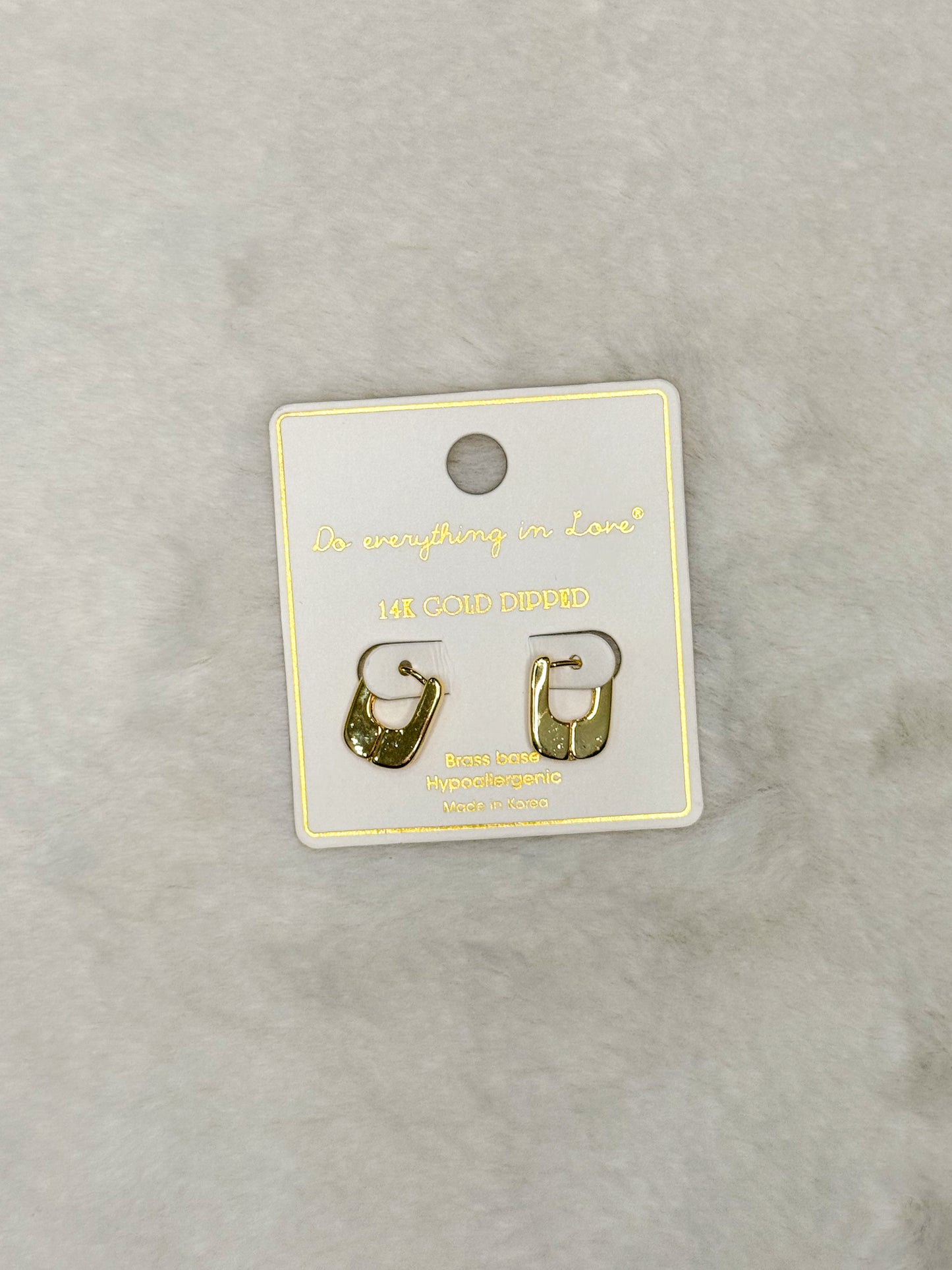 Do everything in Love Urban Gold Huggie Hoops