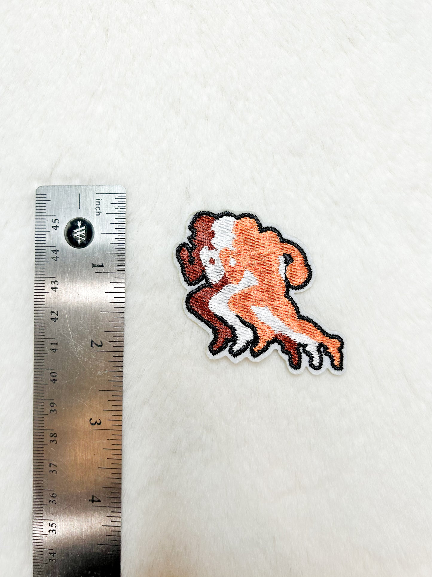 Patch-Running Orange Football Player