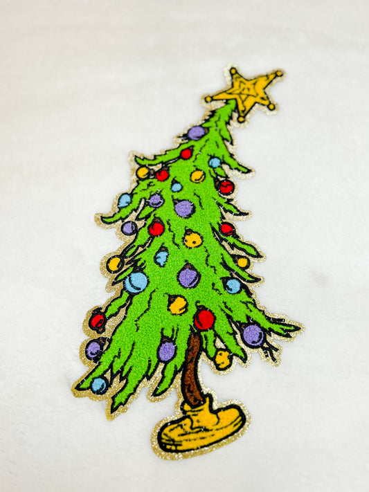 Patch-Leaning Christmas Tree with Ornaments