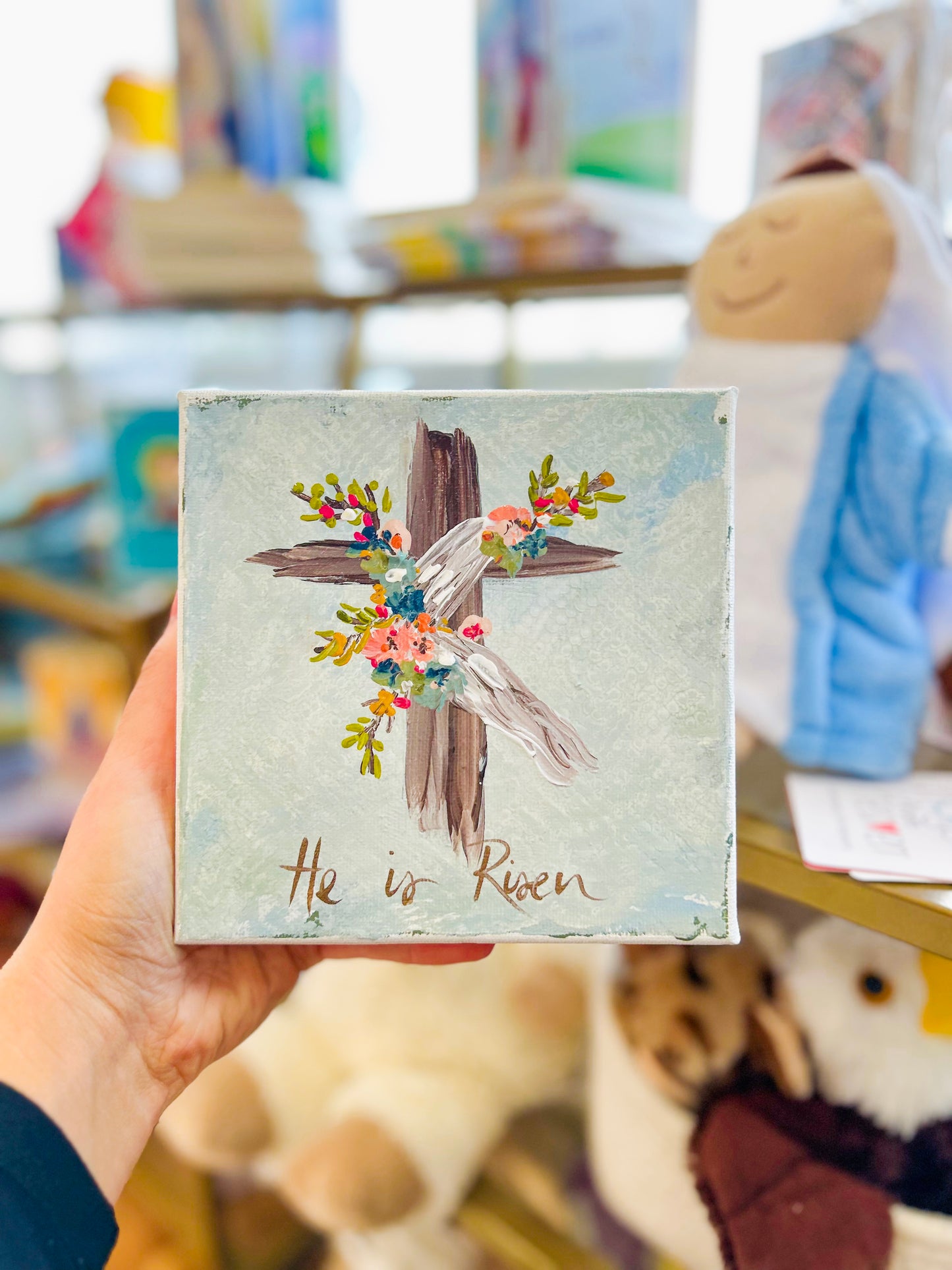 6x6 He is Risen Brown Floral Cross with Blue Background