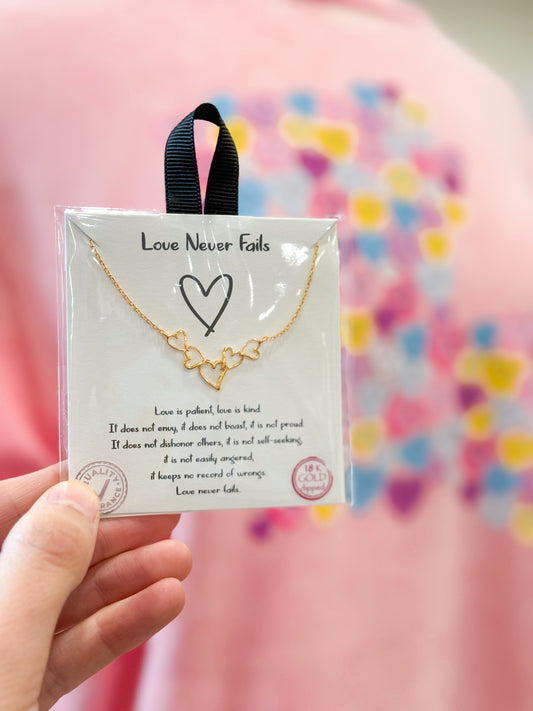 Love Never Fails Gold Heart Necklace