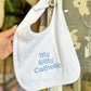 White Itty Bitty Catholic Bib- Blue